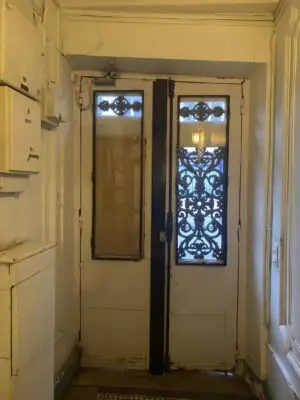 Porte rue 37 Oberkampf face intérieure avant travaux